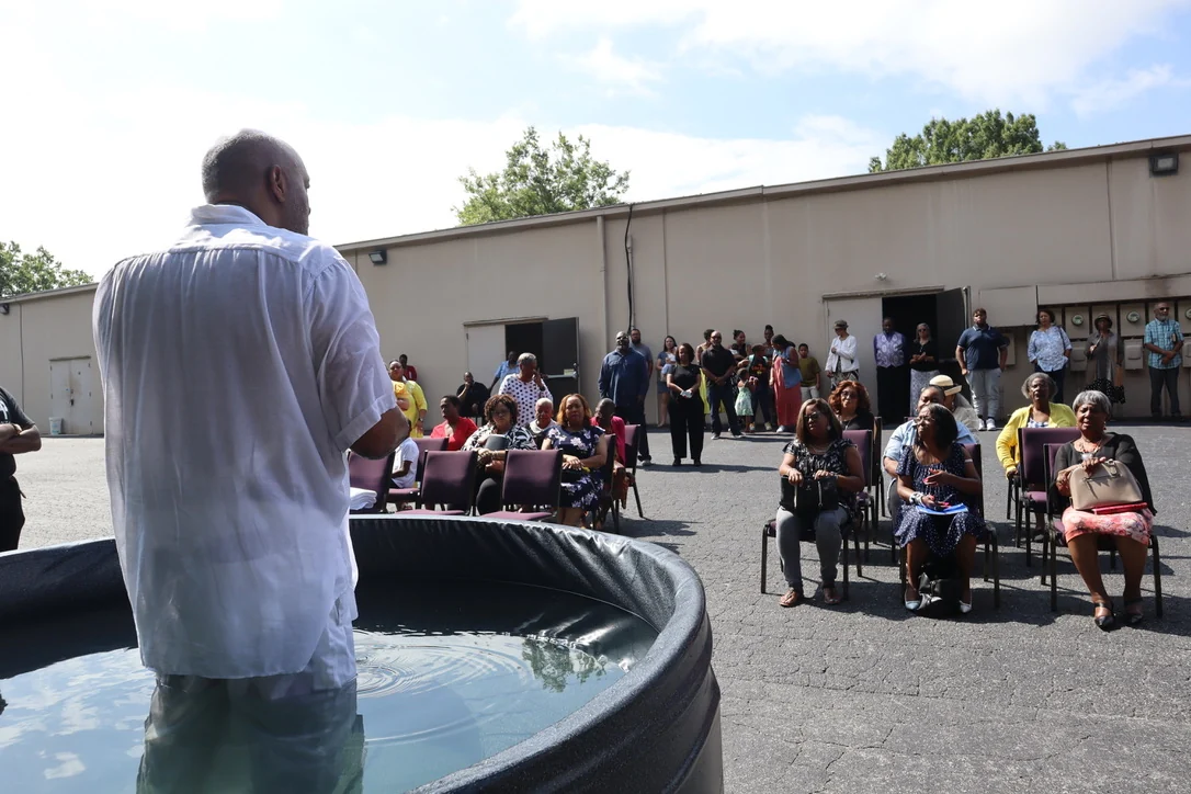 A baptism gathering with the NMCC community