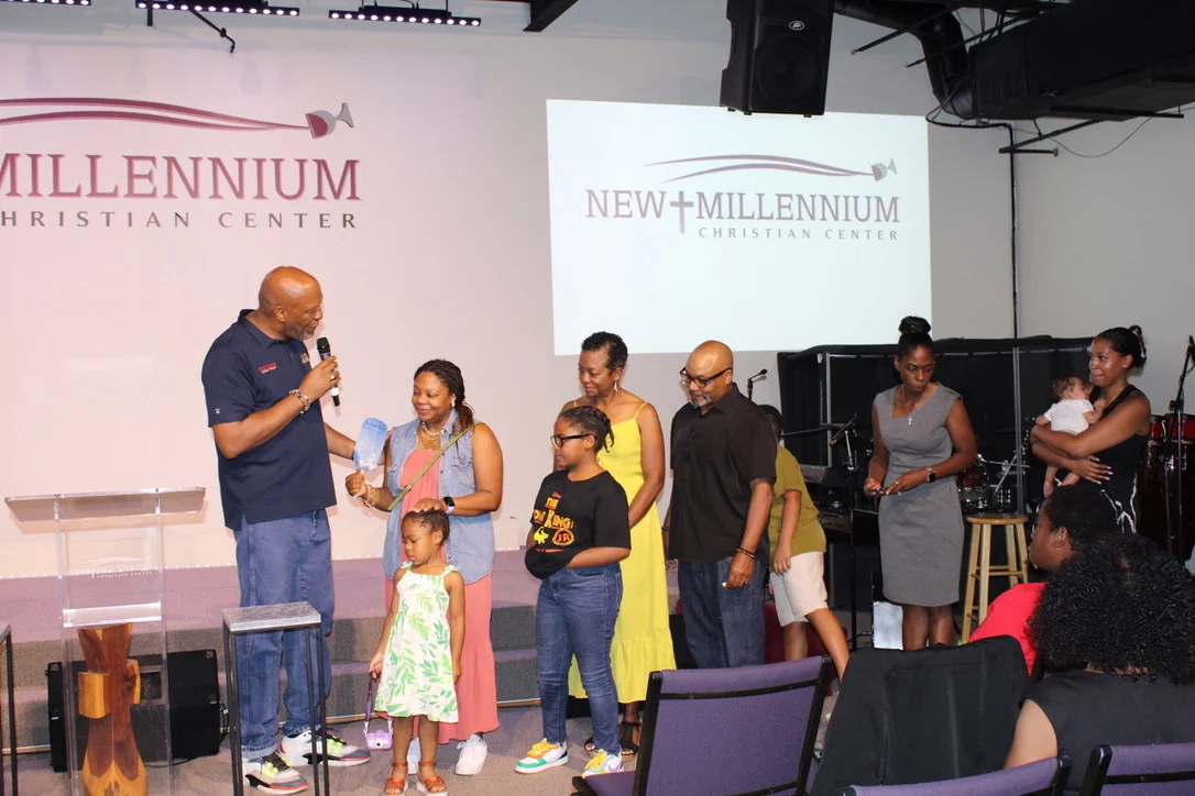 Children and adults sharing a moment on the NMCC platform